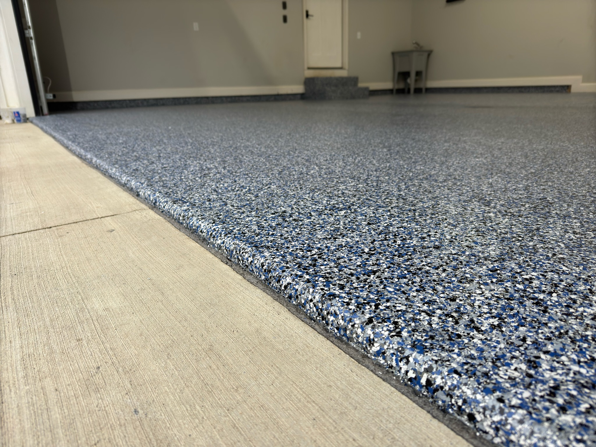 ArmorCore full-flake polyurea coating system installed garage