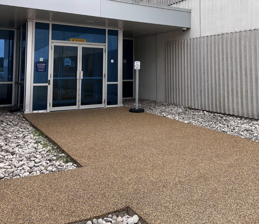 Rubber concrete coating over existing cracked surface