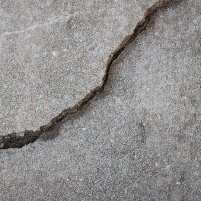 Cracked and heaved sidewalk concrete needing replacement Fort Wayne