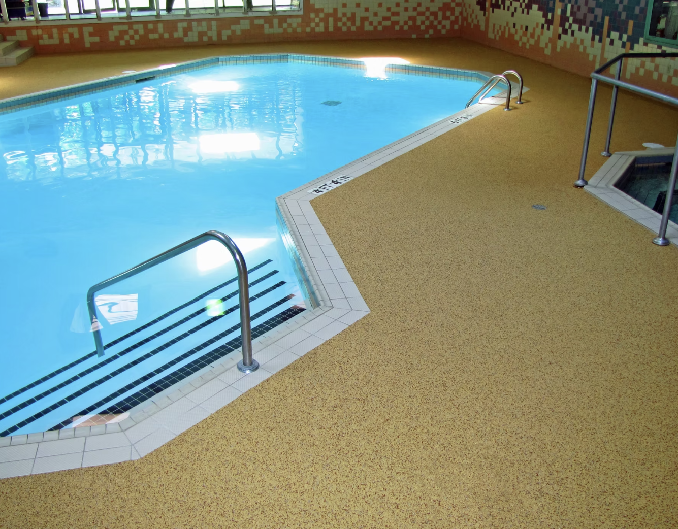 Rubber resurfacing installed over existing pool deck concrete Fort Wayne